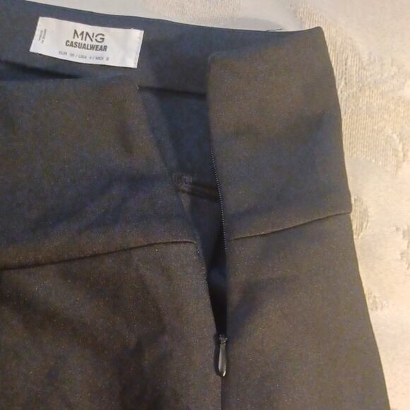 MNG Casualwear Women's Black Pleated Faux Wrap Mini Skirt. 4 - Picture 7 of 10